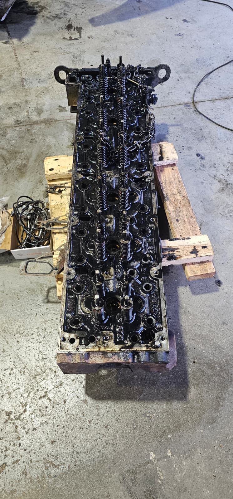 Removed engine cylinder head in the workshop
